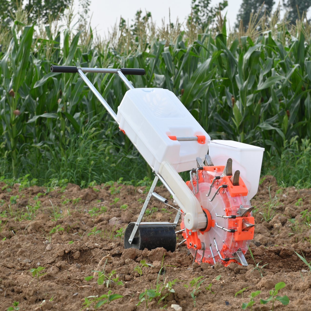 New Hand-Push Wheeled Peanut Soybean Corn Vegetable Precision Seeder on-Demand Machine Planter Seeder